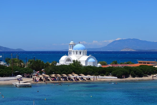 beach of Skala with iconic church of Agioi Anargiroi, Agistri