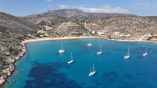 paradise sandy beach of Livadi next to abandoned ruins of castle of Iraklia island