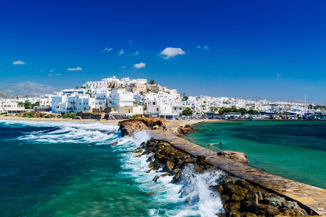 View of Naxos town and breaking waves, Cyclades archipelago